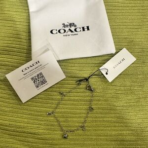Coach Silver Charm Bracelet with Logo